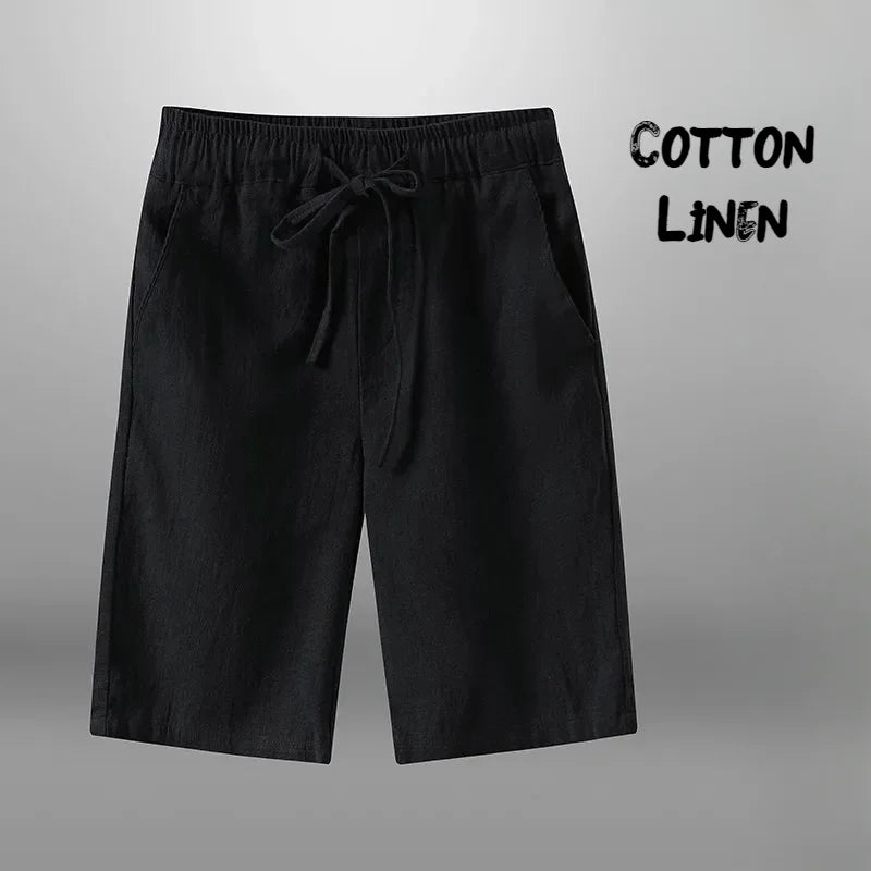 Short en lin et coton noir pour homme – taille élastique avec cordon, poches latérales, fond neutre.