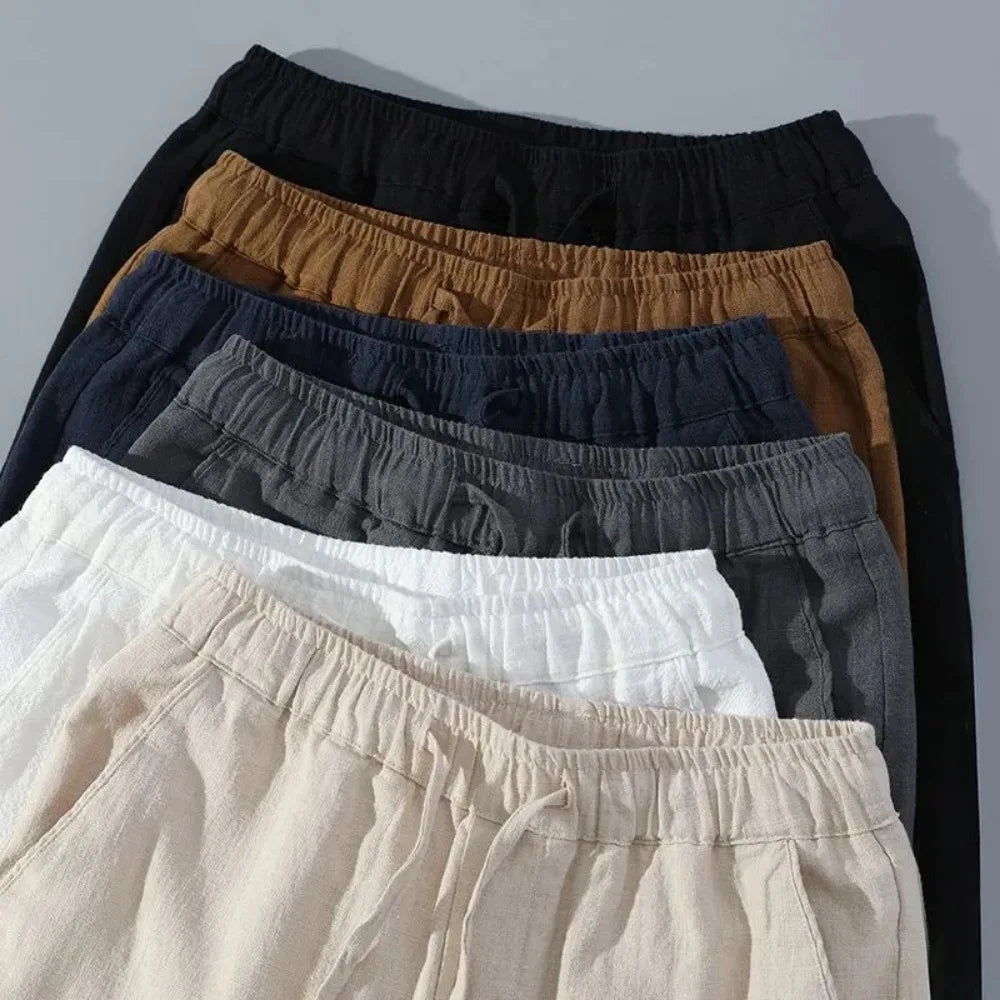 Détail du tissu en lin – léger et respirant.
Gamme de coloris disponibles – noir, beige, marine.
Tableau des tailles – pour un ajustement parfait.

