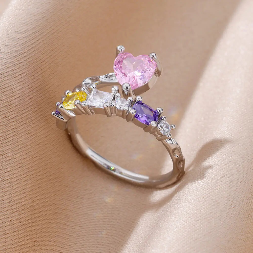 Bague en argent avec pierres multicolores et cœur rose central – Style romantique.