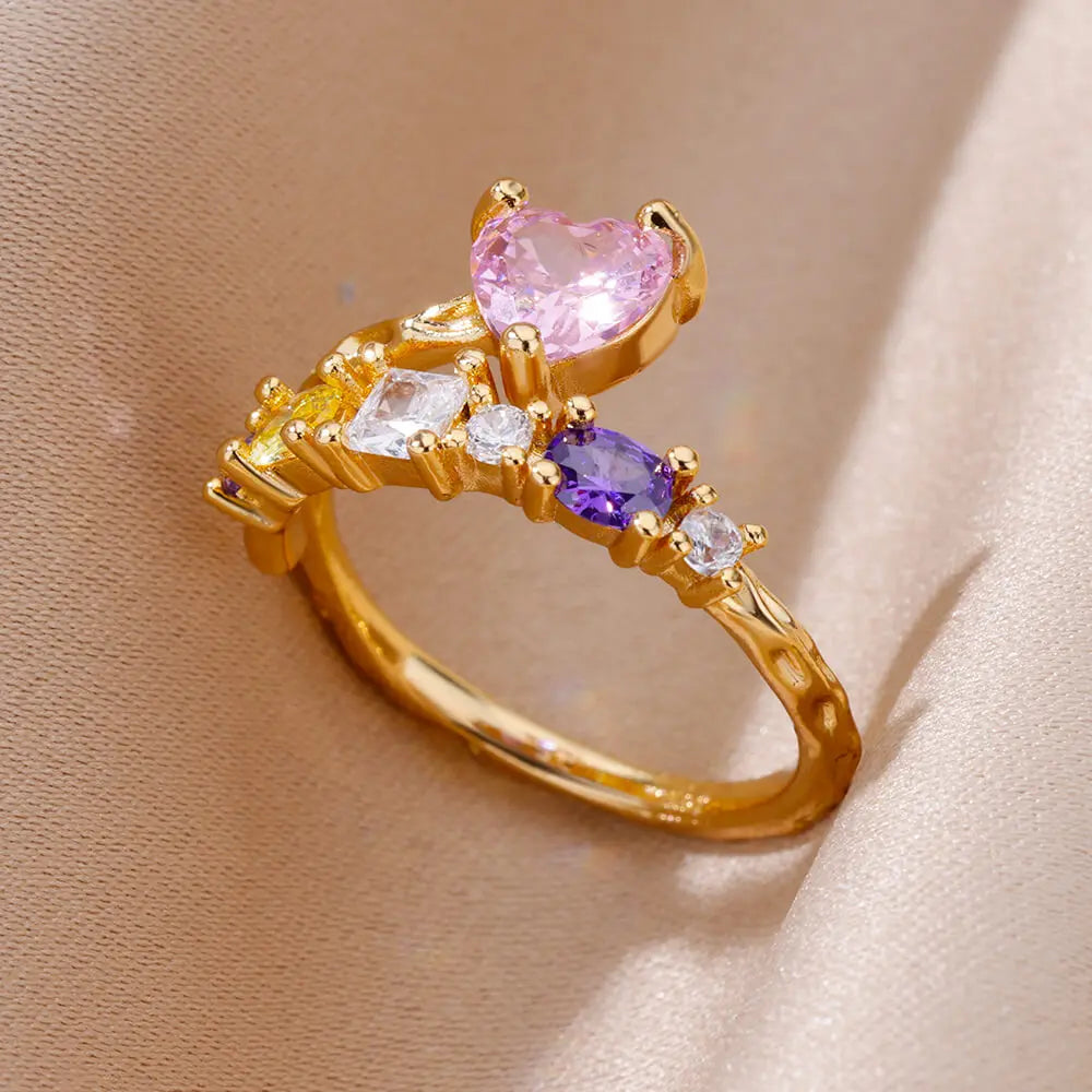 Bague dorée avec pierres colorées et cœur rose – Bijou romantique et lumineux.