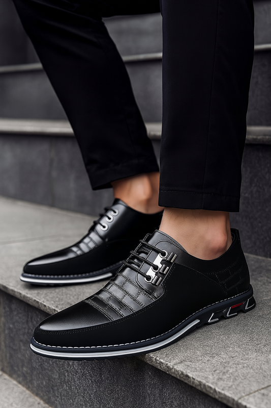 Homme élégant portant des chaussures noires en cuir sur des marches en pierre — style moderne ALTAREV.
