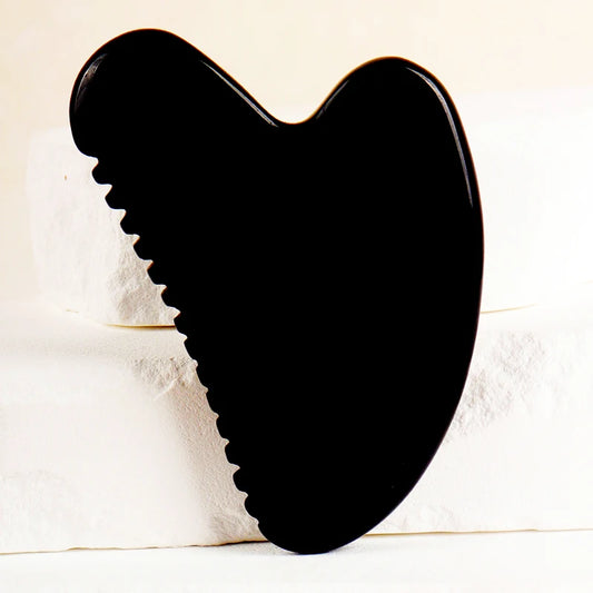 Outil Gua Sha en obsidienne noire – massage visage et corps